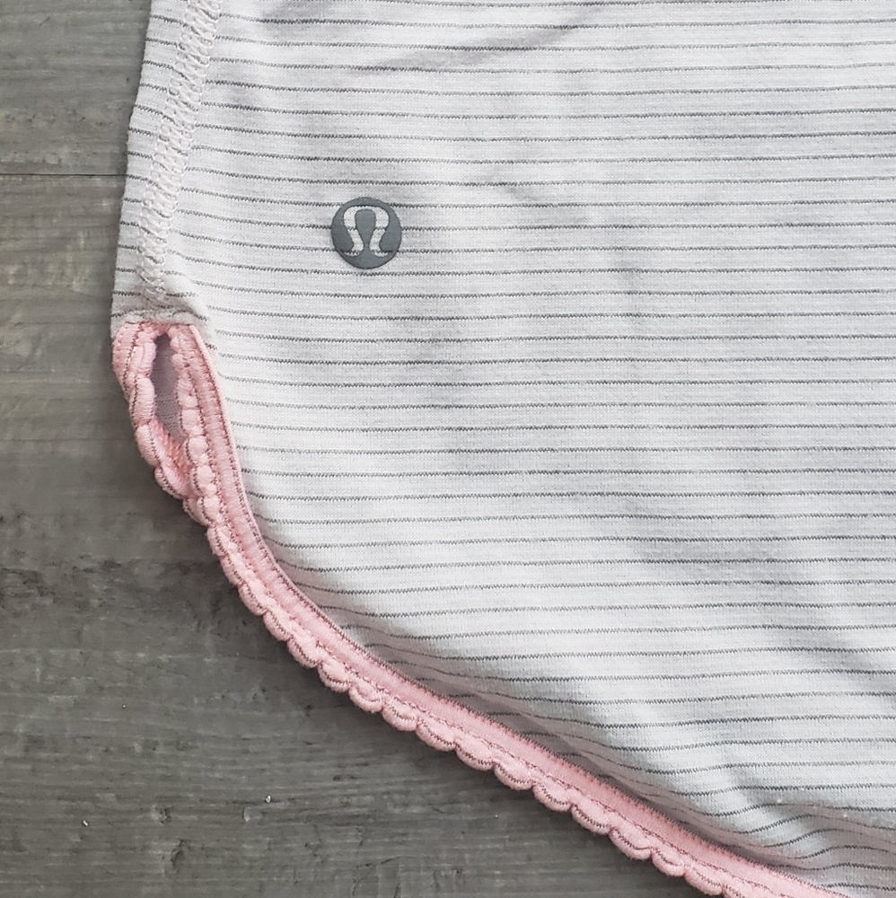 Lululemon lightweight tank w a little pink frill!
